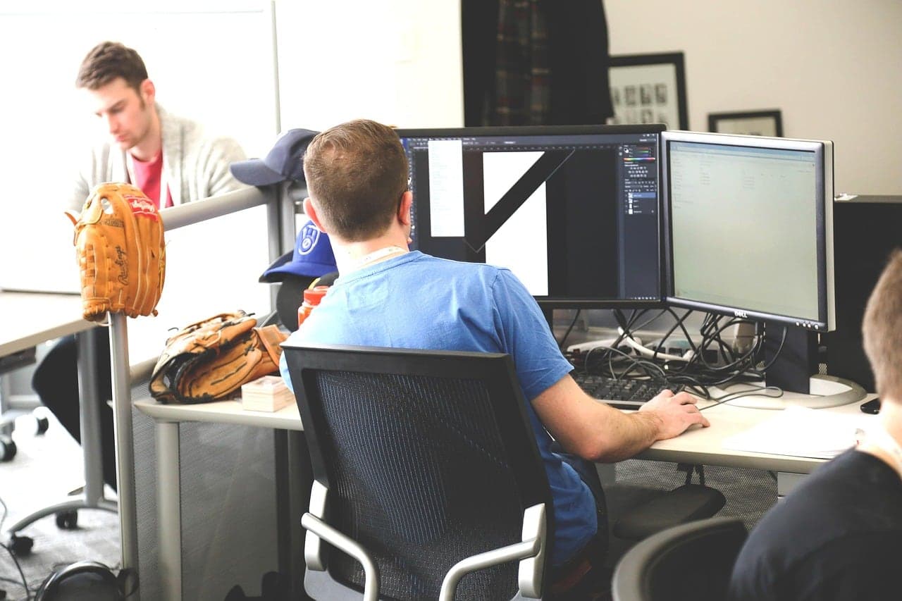 A small office team working at their computers